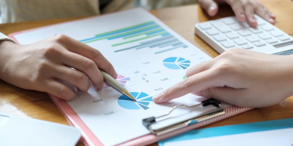 Trader analyzing past trades and market conditions for improvement