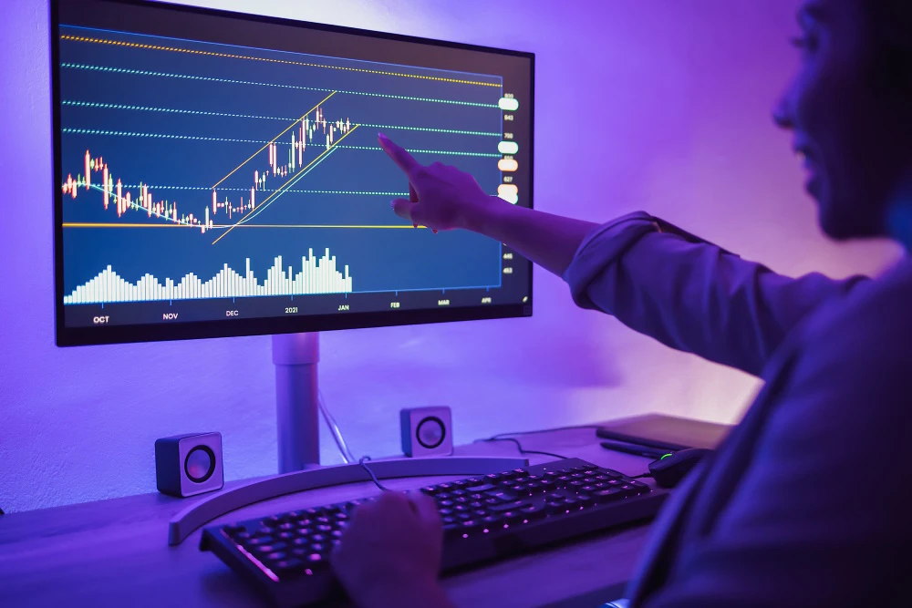 Forex trader analyzing market conditions and economic data to understand price movements